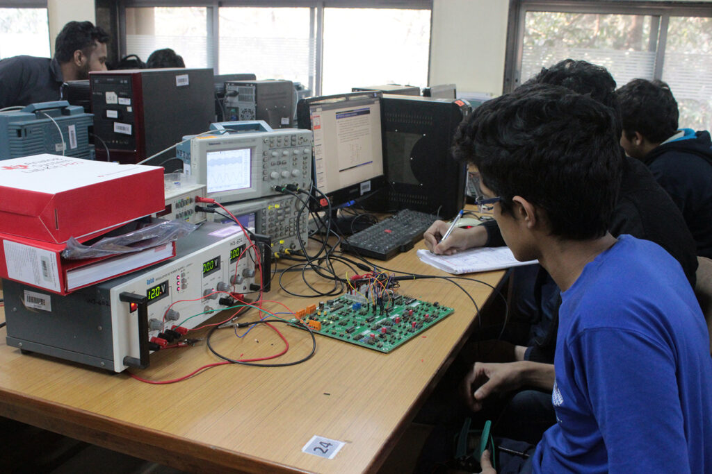 Students performing experiments on Analog devices lab